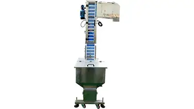 Elevador y alimentador de tapas automático