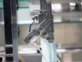 Llenadora por gravedad automática