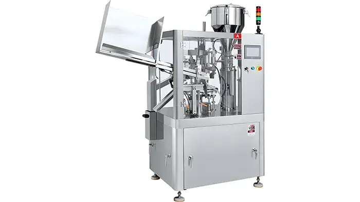Llenadora y selladora de tubos automática